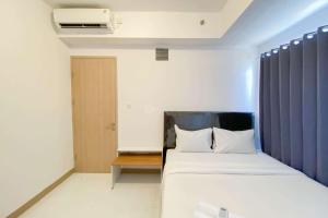 Brand New and Restful 2BR at Tokyo Riverside PIK 2 Apartment By Travelio