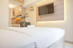 Cozy Studio Room at Tokyo Riverside PIK 2 Apartment By Travelio