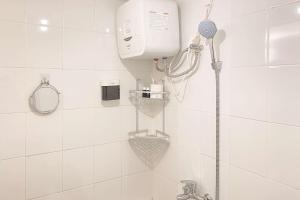 Modern Look 2BR at Bassura City Apartment By Travelio