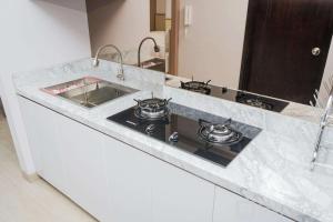 Homey and Cozy Studio Casa De Parco Apartement By Travelio