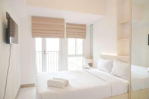 Simply Studio at 18th Floor Tokyo Riverside PIK 2 Apartment By Travelio