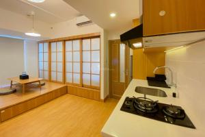 Spacious and Homey 1BR Tokyo Riverside PIK 2 Apartment By Travelio