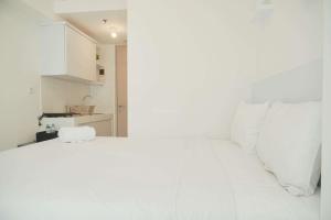 Good and Restful Studio at Tokyo Riverside PIK 2 Apartment By Travelio