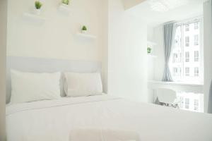 Good and Restful Studio at Tokyo Riverside PIK 2 Apartment By Travelio