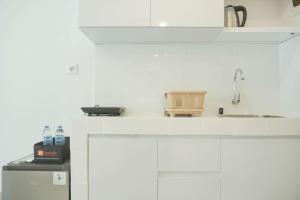 Good and Restful Studio at Tokyo Riverside PIK 2 Apartment By Travelio