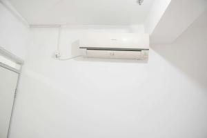 Good Place 1BR Menara Kebon Jeruk Apartment By Travelio