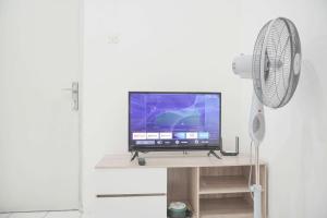 Good Place 1BR Menara Kebon Jeruk Apartment By Travelio