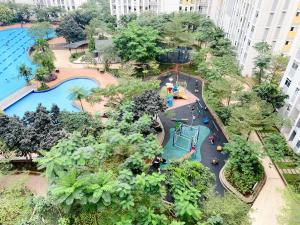 Homey and Simply Look Studio Springlake Summarecon Bekasi Apartment By Travelio