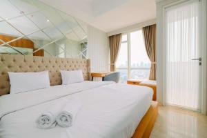 Comfort and Modern Look Studio Menteng Park Apartment By Travelio