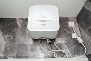 Minimalist and Cozy Studio Apartment at Tuscany Residences By Travelio