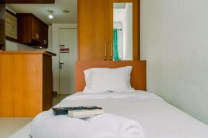 Cozy and Comfort Studio Room at Poris 88 Apartment By Travelio