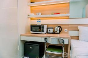 Simply Studio Apartment at Aeropolis Residence By Travelio