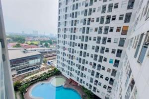 Homey and Cozy Studio Room Serpong Garden Apartment By Travelio