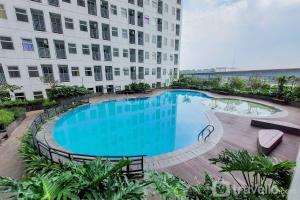 Homey and Cozy Studio Room Serpong Garden Apartment By Travelio