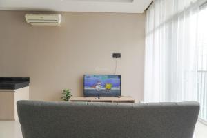 Best Homey and Nice 2BR at Ciputra International Apartment By Travelio