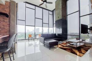 Spacious 2BR Loft at Brooklyn Alam Sutera Apartment By Travelio