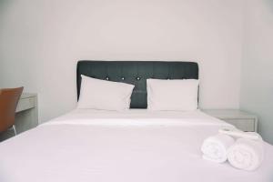 Comfortable and Homey 2BR at Transpark Bintaro Apartment By Travelio