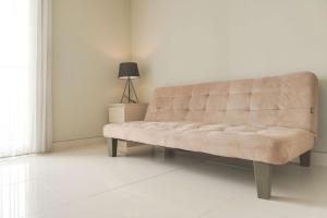 Homey and Warm 1BR at Ciputra International Apartment By Travelio