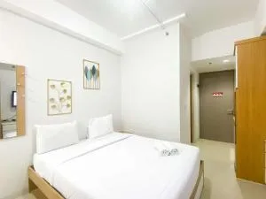 Modern Design Studio at Vasanta Innopark Apartment By Travelio - Cibuntu