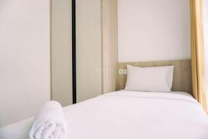 Modern and Homey 2BR Apartment at M-Town Residence By Travelio