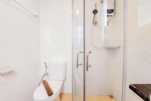 Spacious and Homey 3BR at Sky House BSD Apartment By Travelio