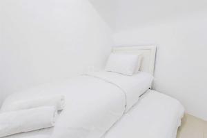 Homey and Comfort Living 2BR Urbantown Serpong Apartment By Travelio