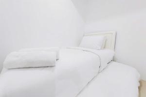 Homey and Comfort Living 2BR Urbantown Serpong Apartment By Travelio