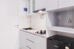 Homey and Comfort Living 2BR Urbantown Serpong Apartment By Travelio