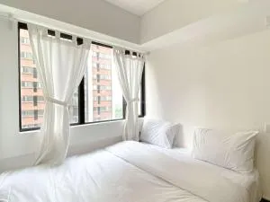 Best Deal and Comfy 2BR at Meikarta Apartment By Travelio - Badami