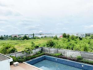 Comfy Studio with Twin Bed at Enviro Apartment By Travelio