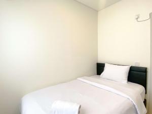 Comfortable and Spacious 3BR Meikarta Apartment By Travelio