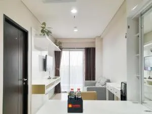 Minimalist and Cozy 1BR at Patraland Amarta Apartment By Travelio - Ngemplak