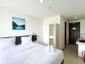 Enjoy Living Studio at Enviro Apartment By Travelio