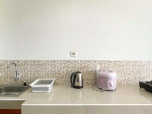 Enjoy Living Studio at Enviro Apartment By Travelio