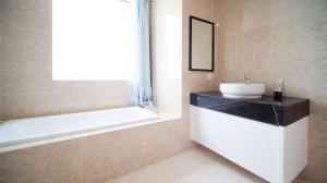 Homey 3BR with Private Lift at Grand Sungkono Lagoon Apartment By Travelio