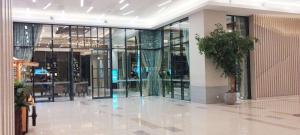 Simple and Homey 2BR at Benson Supermall Mansion Apartment By Travelio
