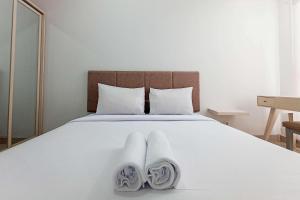 Modern Studio at Barsa City Apartment By Travelio