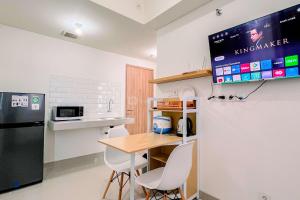 Cozy 1BR (No Kitchen) at Bandaraya - Tallasa City Makassar Apartment By Travelio