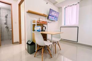 Cozy 1BR (No Kitchen) at Bandaraya - Tallasa City Makassar Apartment By Travelio