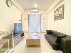 Comfortable Living 2BR at Meikarta Apartment By Travelio