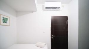 Compact and New 2BR Apartment at Suncity Residence By Travelio