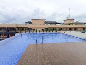 Best Homey and Restful Studio at Altuz Seturan Yogyakarta Apartment By Travelio