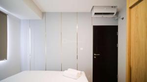 New and Homey 2BR Apartment at Suncity Residence By Travelio