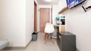 Tranquil Studio (No Kitchen) Apartment Bandaraya - Tallasa City Makassar By Travelio