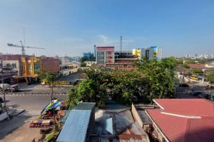 Simply Look Studio Apartment at Mansyur Residence By Travelio