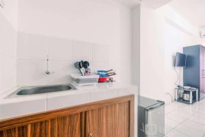 Beautiful Studio at Gunung Putri Square Apartment By Travelio