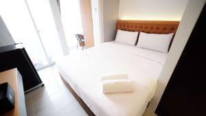 Tidy and Cozy Stay Studio Apartment at Suncity Residence By Travelio