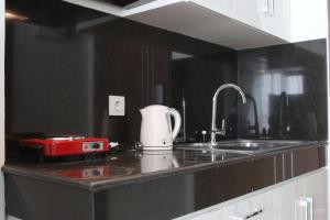 Strategic Studio at Green Kosambi Bandung Apartment By Travelio