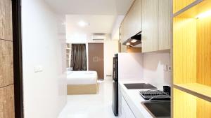 Good Choice Studio at Delft Ciputra Makassar Apartment By Travelio