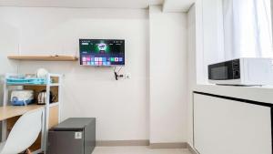 Cozy Designed Studio (No Kitchen) Bandaraya - Tallasa City Makassar Apartment By Travelio